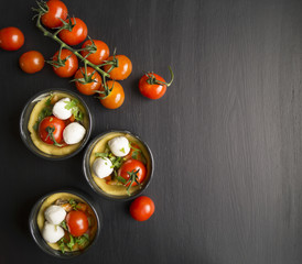 Naklejka na ściany i meble tartlet with mozzarella and cherry tomatoes