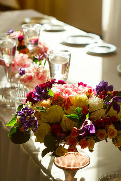 Beautiful Composition with flowers on the wedding table