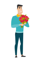 Caucasian businessman holding a bouquet of flowers