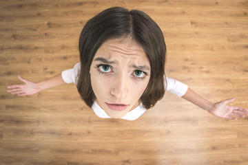 The confused woman gesture. View from above