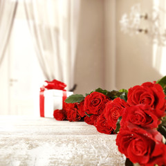 wooden desk with roses and free space for your decoration 