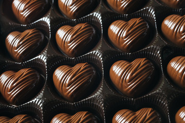 Box of heart-shaped chocolate candies for Valentine's day