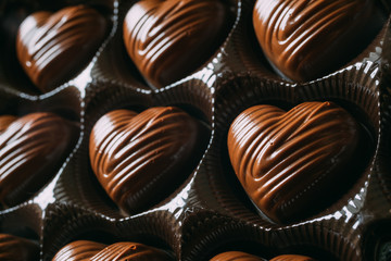 Closeup on box of heart-shaped chocolate