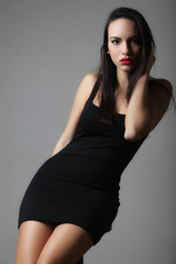 Fototapeta premium Fashion portrait of beautiful young woman