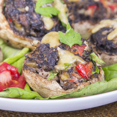 Stuffed champignons with eggs, cheese and paprika.