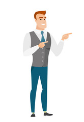 Young caucasian businessman pointing to the side.