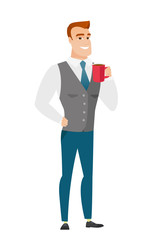 Young caucasian businessman holding cup of coffee.