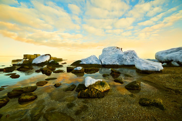 winter calm sea at sunset in winter
