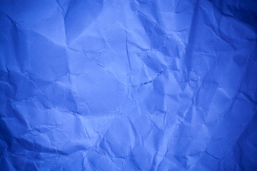 Blue crumpled paper texture background.