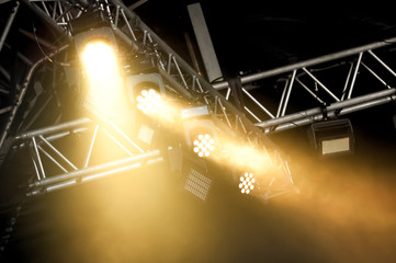 stage spotlights through smoke - 134355728