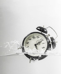 Drowning clock in the water