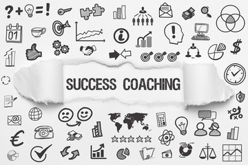 Success Coaching / weißes Papier mit Symbole