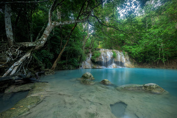 Naklejka premium Waterfall in forest at Erawan waterfall National Park, Kanchanaburi, Thailand