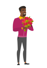 African-american businessman holding flowers.