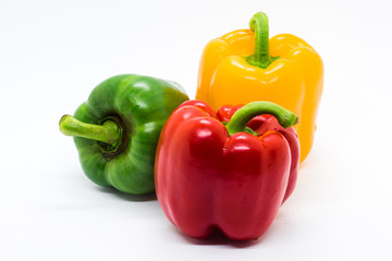 Multi color Bell peppers on white background