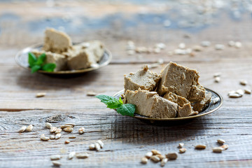 Fototapeta premium Traditional oriental dessert halva on the plate.