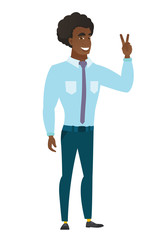 Obraz premium Caucasian businessman showing the victory gesture.