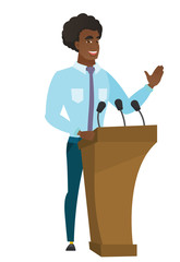 Politician giving a speech from tribune.