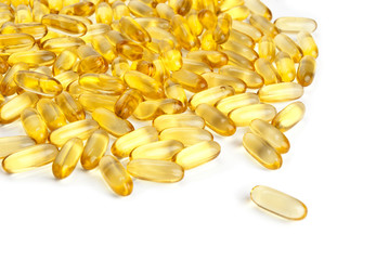 Yellow Vitamin Oil Capsules Macro Closeup Isolated