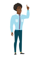 Businessman with open mouth pointing finger up.