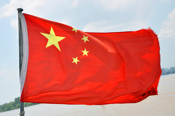 Flag of China on the Yangtze River in Nanjing, Jiangsu Province, China.