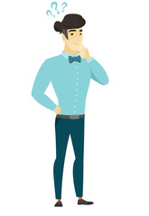 Thinking businessman with question marks.