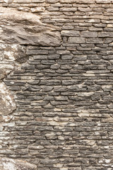 Background wall made of grey stone rocks