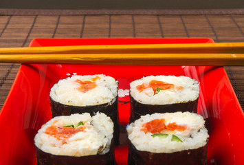 still life - set the rolls on a red plate