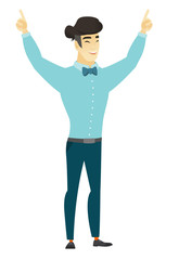 Businessman standing with raised arms up.