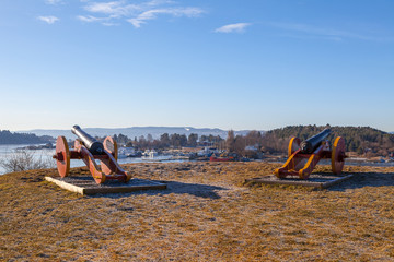 Old cannons of former fort on the Norwegian island near Oslo