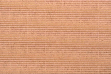 Cardboard background. Abstract brown background of paper, cardboard texture.