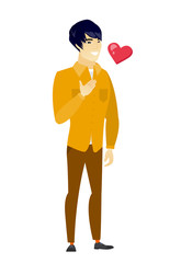 Asian business man holding hand on his chest.