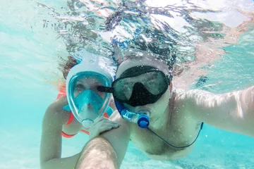 Fotobehang A couple in love taking selfie underwater in Indian Ocean, Maldives © Photocreo Bednarek