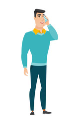 Obraz premium Businessman talking on a mobile phone.