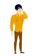 Businessman talking on a mobile phone.