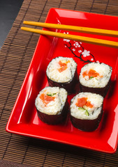 still life - set the rolls on a red plate