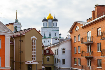 Orthodox church at the background of modern living blocks