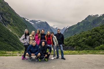 Group of young people is travelling around the Norway - 134370131
