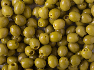 Background of olives. Background with green olives. Olives.  Olive