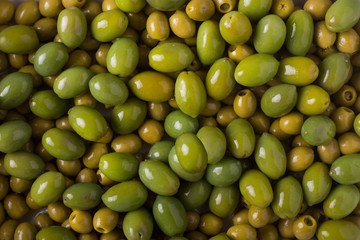 Background of olives. Background with green olives. Olives. Olive