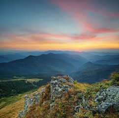 Mountains during sunset. Beautiful natural landscape in the summer time..