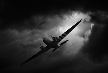 Fototapeta na wymiar dakota airplane in stormy weather