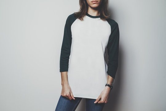Young hipster girl wearing blank white t-shirt with green long sleeve, mock-up of t-shirt long sleeve