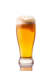 light cold beer in frosty glass isolated on white