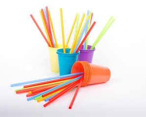 disposable colorful cups and drinking straws