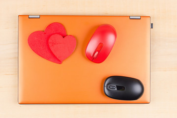 Two red hearts and two mice on Portable PC