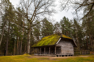 View of the rustic farm storehouse. Wooden architecture of North and Baltics