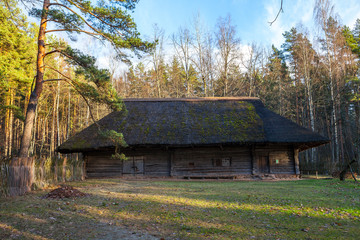 Fototapeta na wymiar View of the rustic farm dwelling. Wooden architecture of North and Baltics