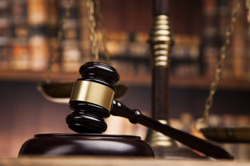 Law books, mallet of the judge, Courtroom background