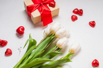 composition with tulips and gift box, valentine's or mother' day.